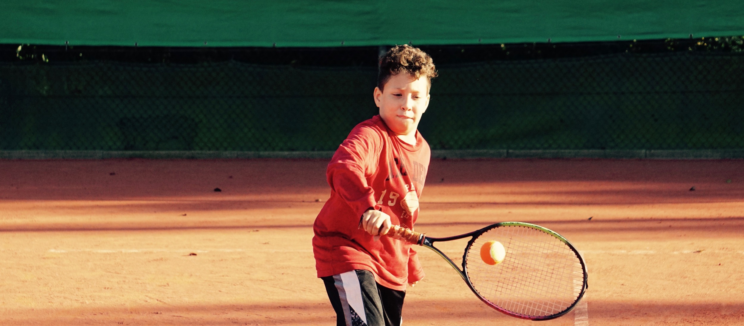 tenniskids groen enkelhandig backhand